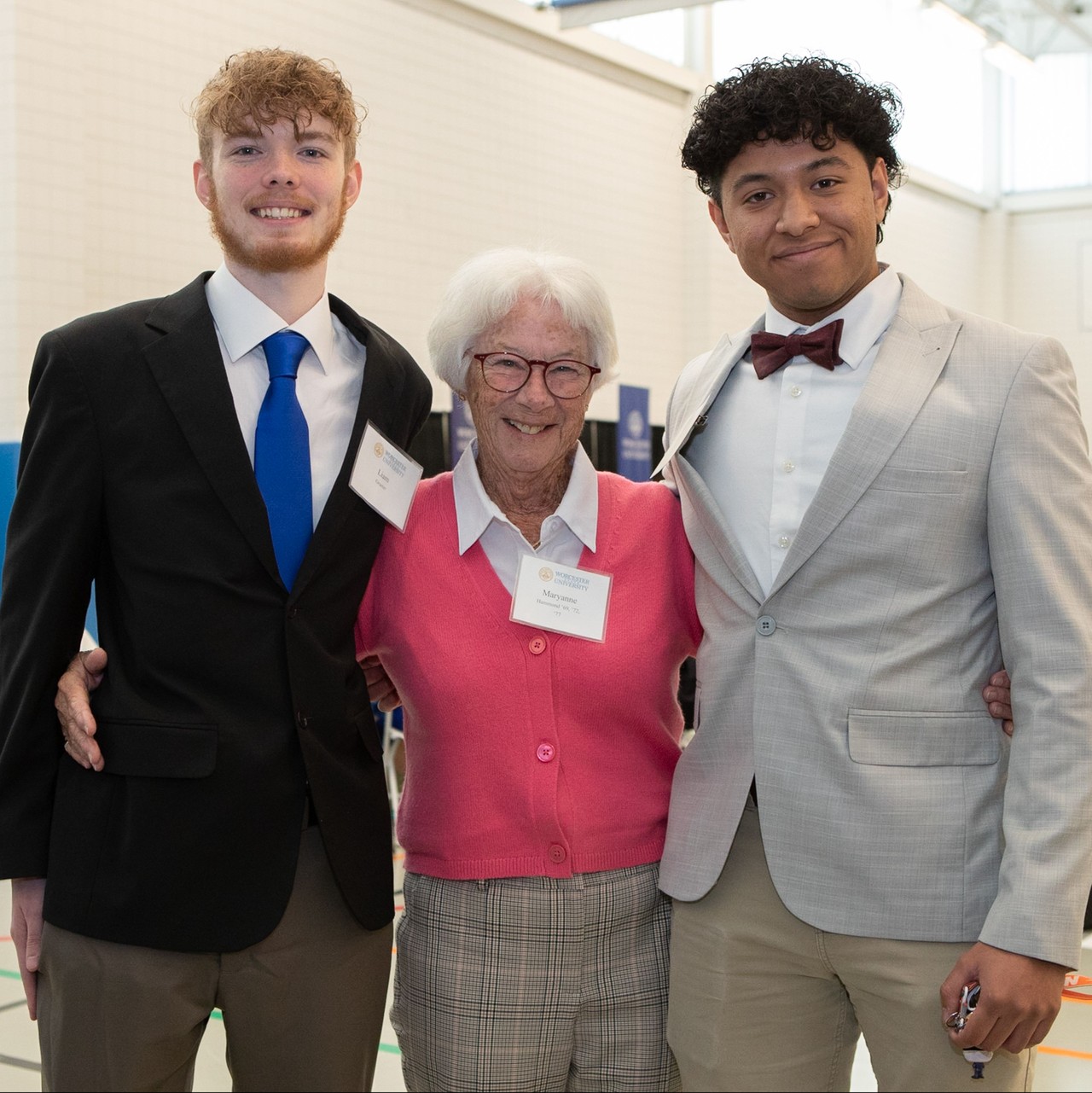 Donor with two students at annual Scholarship Donor and Recipient Brunch 