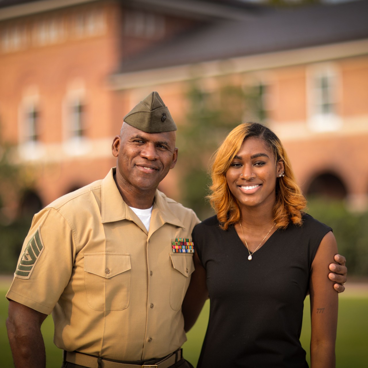 Active duty Marine and his daughter, a scholarship recipient